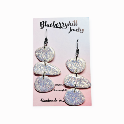 Pebbles hologrammi korvakorut